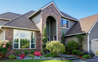 Oakville residential property with large energy-efficient front windows.