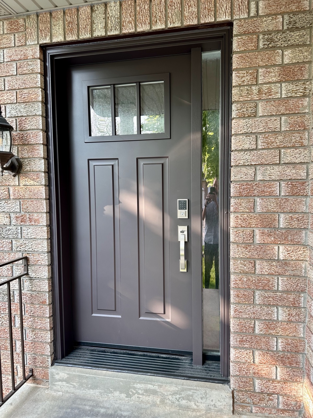 Entry door with sidelites on a brick home installed by Optima Windows and Doors in the Greater Toronto Area