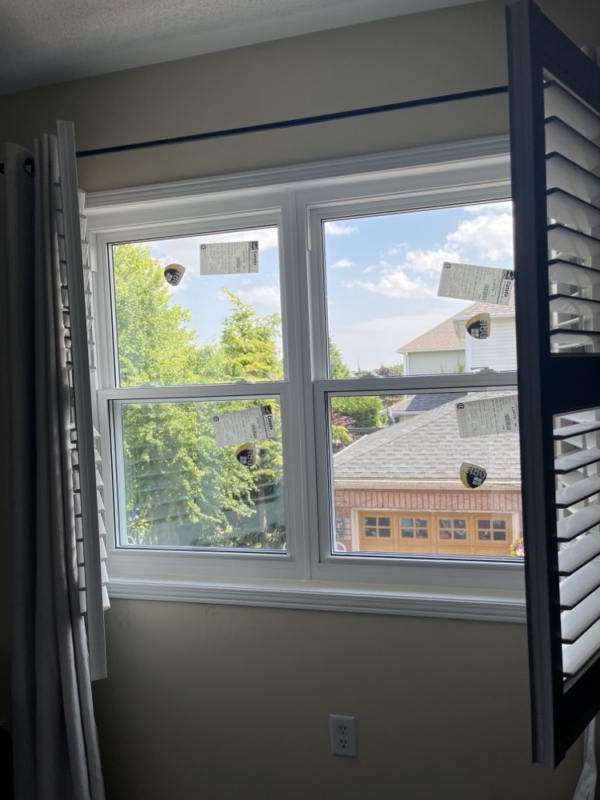 Window replacement, white frames in Whitby, Ontario by Optima Windows and Doors, photo from Janet Smith's 5-star Google review